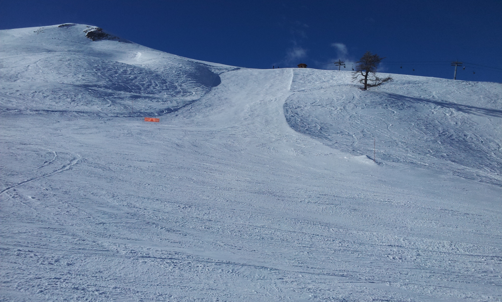 Perdrix kék pálya a TS Ubaguets ülőlifttől indul és ezen is le kell csúszni az átjáró felé, ha nem működik a TS Pouret.