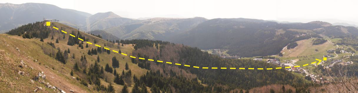 A hegytetőről az üdülőfaluba